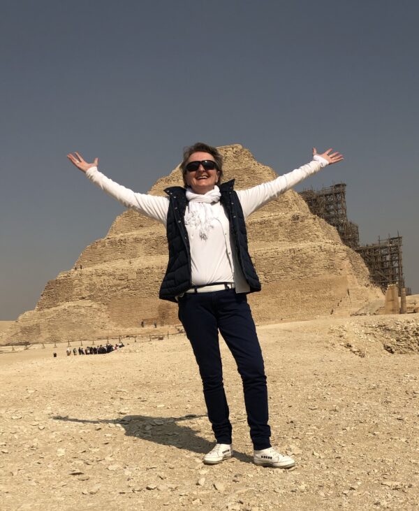 Cristina Teot standing in front of the Step Pyramid at Saqqara